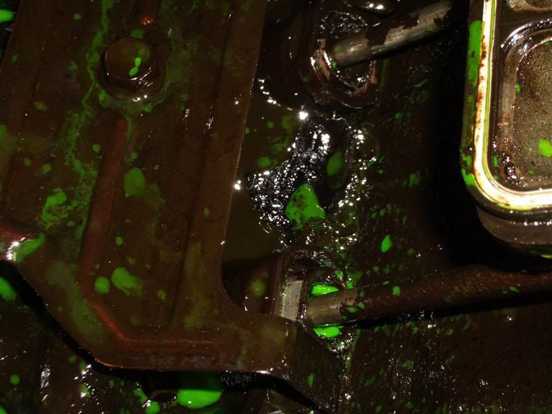 HELP!! lot of gunk under valve covers... is this from coolant?? how to